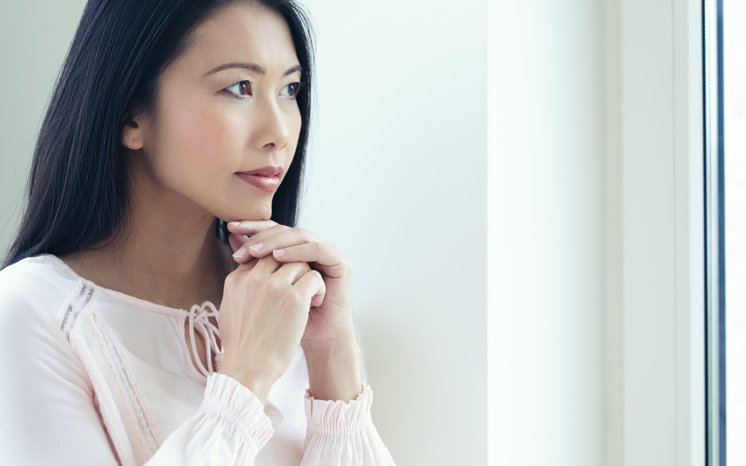 Woman contemplating her self-care story